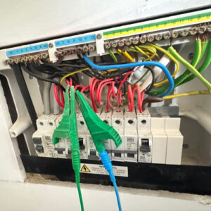 Test probes connected across the ring main circuit during continuity and fault‑finding checks