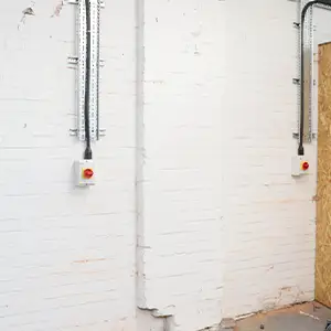 Two 63A three‑phase isolators installed for commercial laundry equipment.