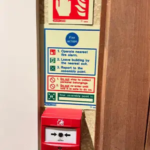 Fire Alarm Call Point & Safety Signage — Checking activation points and evacuation instructions for compliance