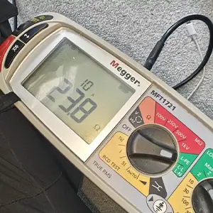 Megger MFT1721 tester displaying a high Zs reading during an electrical safety test.