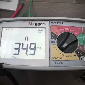 Megger MFT1741 performing an RCD test showing 34.9 ms trip time on display.