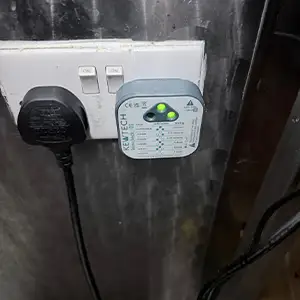 “Socket tester showing incorrect wiring during an EICR inspection in a London property