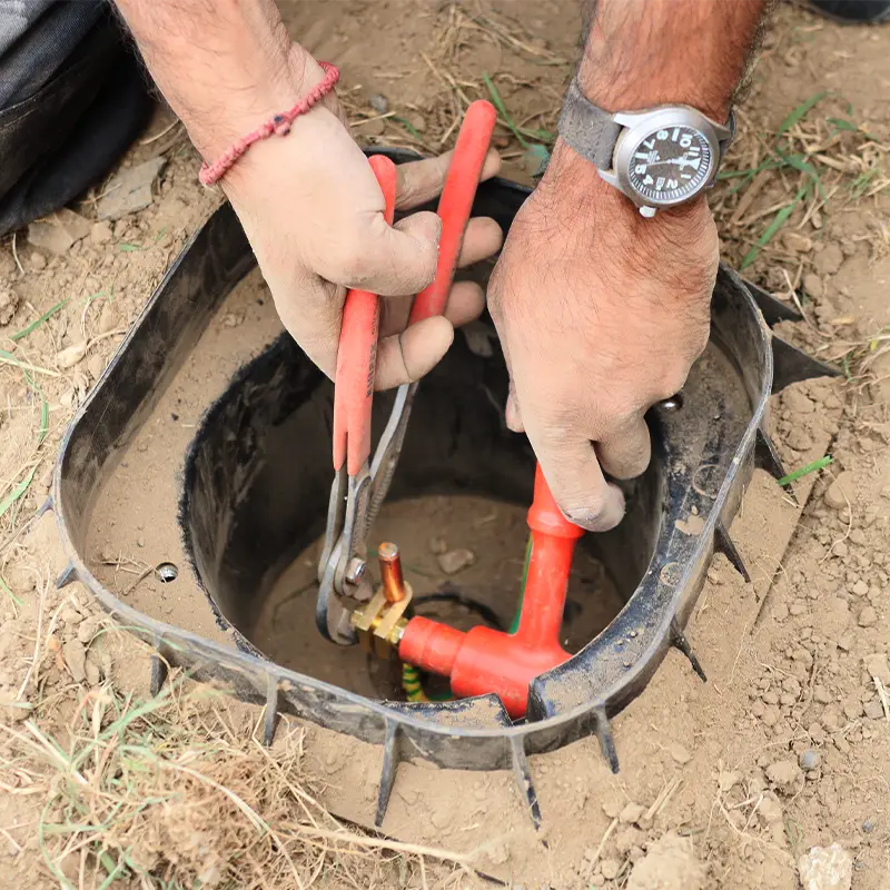 Earthing conductor terminated at the earth rod